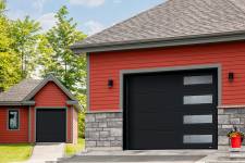 These garage doors are in the Moderno 2 beads design, 6' x 7' and 10' x 8', Black, window layout: Right-side Harmony.